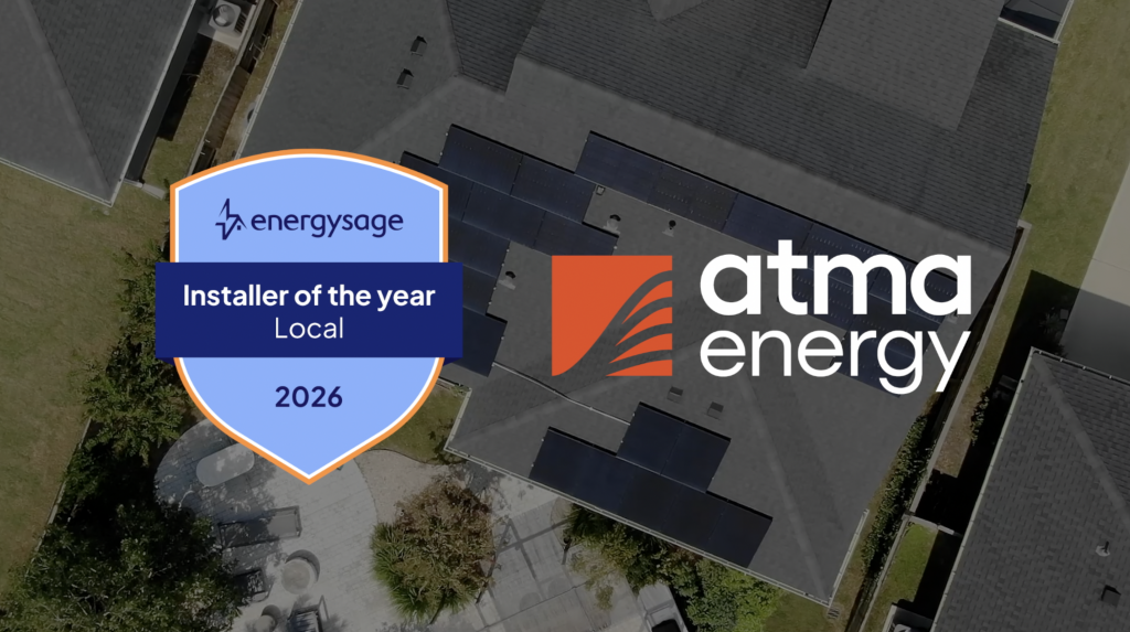 A house with solar panels and a solar panel installation company logo overlaid, labeled "Installer of the year Local 2026".